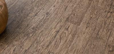 Living room vinyl plank flooring installation in family home